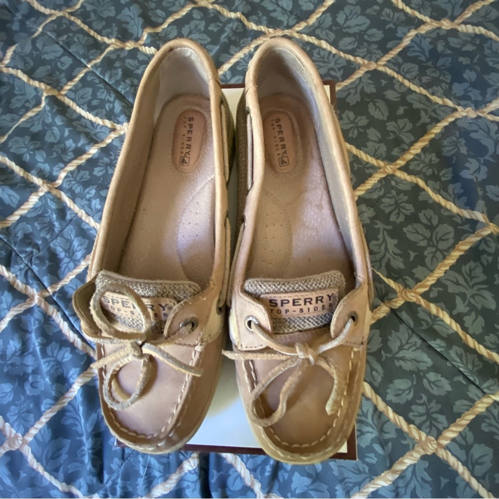 Sperry beige boat shoes.